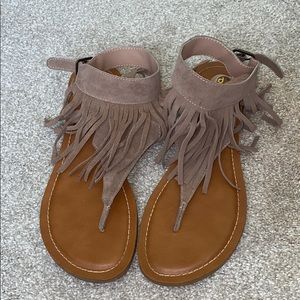 Restricted taupe fringe sandals